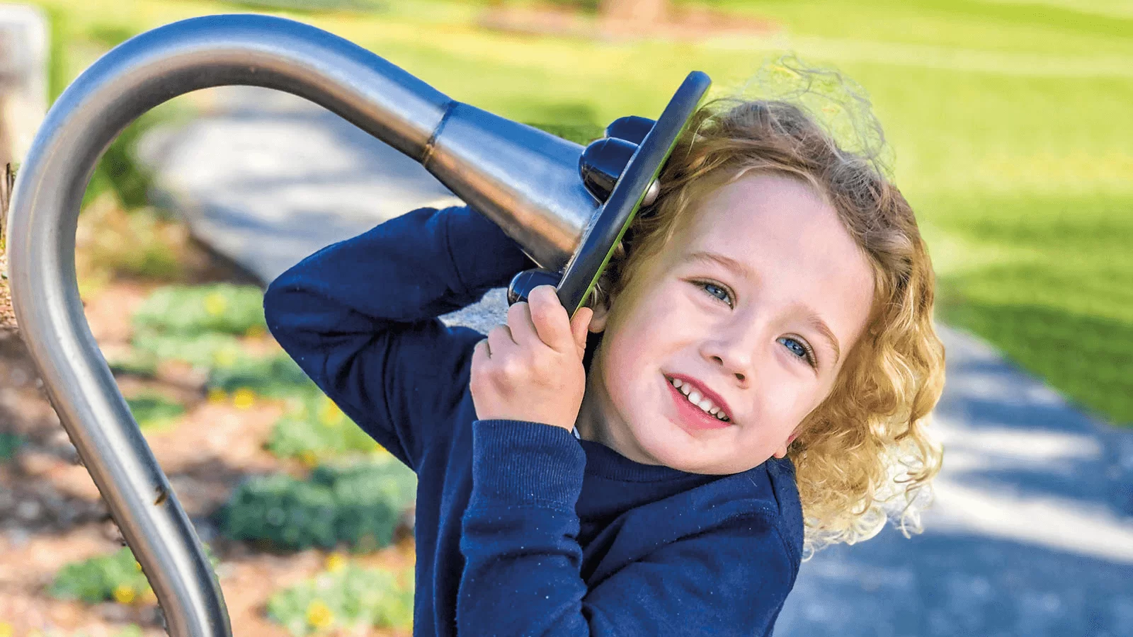 Children Laughing While Exploring Autism Friendly Sensory Playground Equipment